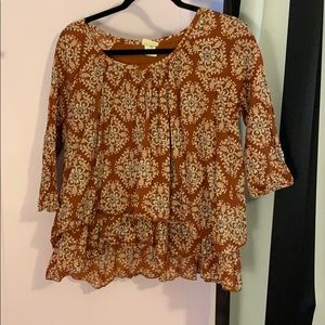 Peplum patterned top